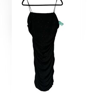 Long black dress size 1x never worn with tag